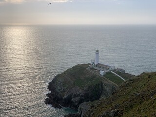 Looking out to see with lighthouse on the coast