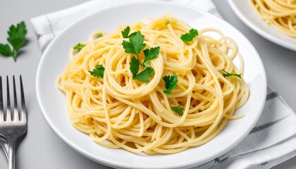 Spaghetti with Parsley Garnish on White Plate, Isolated on Gray Background