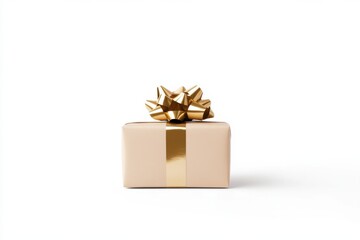 Elegant gift box wrapped in beige paper with gold ribbon and bow on clean white background. Celebration and luxury present concept.