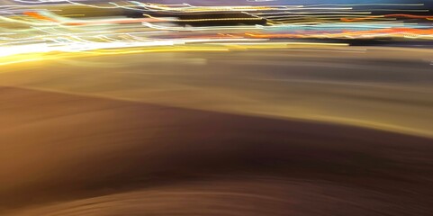 Selective focus photography. A frame in motion. Abstract background. Colorful image. Long shutter speed. Light streaks. Movement of transportation. Shooting from transportation. Blurred image