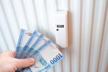 Heating cost concept with Hungarian forint banknotes
