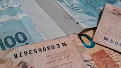 Close up of Brazilian currency notes - Powered by Adobe