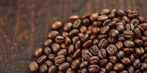 Obraz premium Dark oak wood background, macro close-up of fresh roasted coffee beans, brew, coffee beans