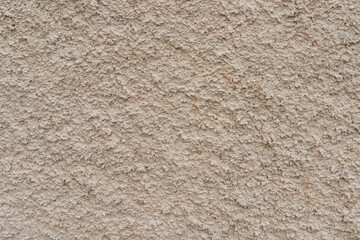 stone wall of the old burnt stone fort is dark brown and