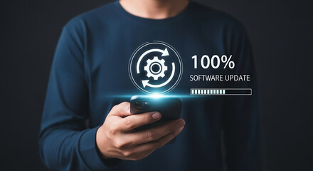 Person holding smartphone with digital progress bar and update icon showing 100 percent complete software update process on modern mobile device interface