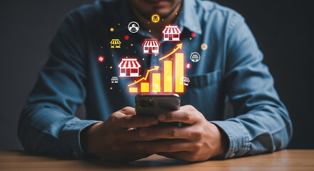 Man using smartphone with virtual storefront icons and bar chart representing ecommerce business growth online sales digital marketing and retail expansion success

