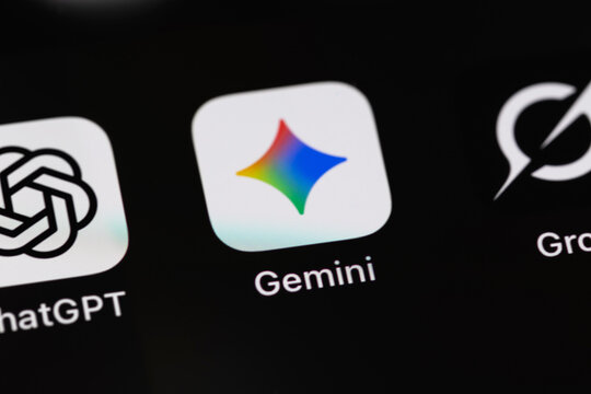 Google Gemini mobile icon app on a screen closeup smartphone iPhone closeup. Gemini is an AI assistant from Google. Batumi, Georgia - May 4, 2025