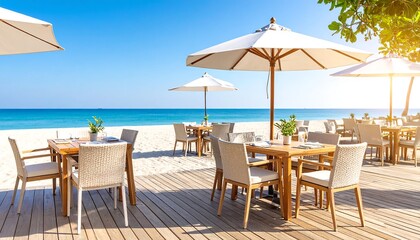 Beachfront dining patio under white umbrellas