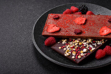 Bar sweet craft artisan chocolate with dried fruits made at home. Craft chocolate
