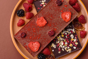 Bar sweet craft artisan chocolate with dried fruits made at home. Craft chocolate