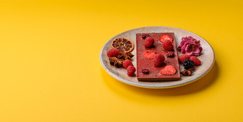 Bar sweet craft artisan chocolate with dried fruits made at home. Craft chocolate