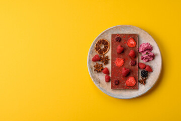 Bar sweet craft artisan chocolate with dried fruits made at home. Craft chocolate