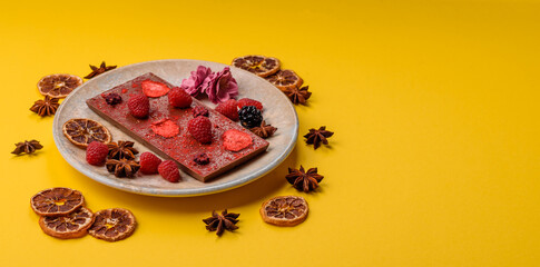 Bar sweet craft artisan chocolate with dried fruits made at home. Craft chocolate
