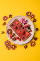 Bar sweet craft artisan chocolate with dried fruits made at home. Craft chocolate