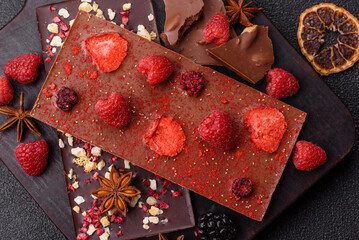 Bar sweet craft artisan chocolate with dried fruits made at home. Craft chocolate
