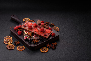 Bar sweet craft artisan chocolate with dried fruits made at home. Craft chocolate
