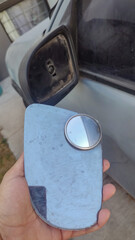 Broken driver's rearview mirror, damaged left rearview mirror.