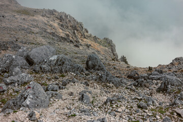 Rocky limestone terrain on Kefalonia island, Greece. Dramatic karst landscape with scattered...