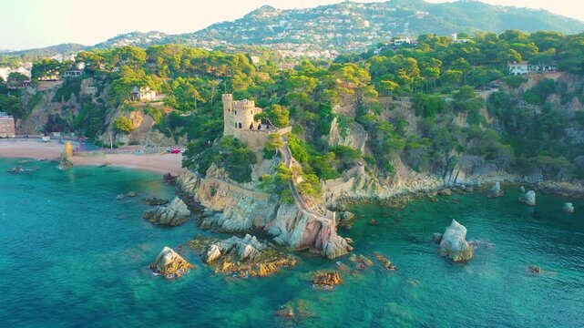 Aerial 4K video from drone to castell d'en plaja castle lloret de mar in costa brava, spain