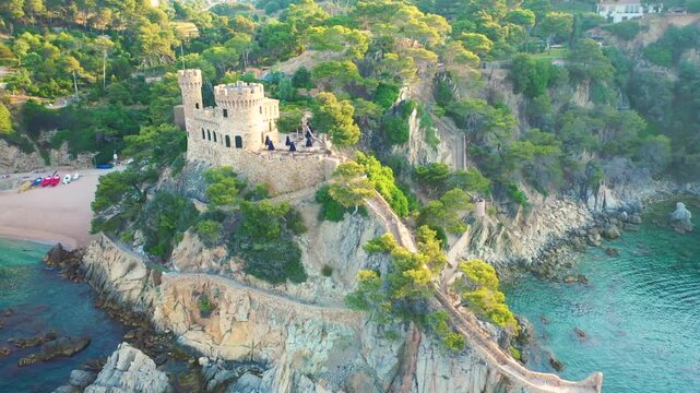 Aerial 4K video from drone to castell d'en plaja castle lloret de mar in costa brava, spain