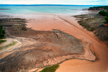 Low-tide at the confluence of the Tennycape River where it empties into the Minas Basin on Cobequid Bay in Nova Scotia