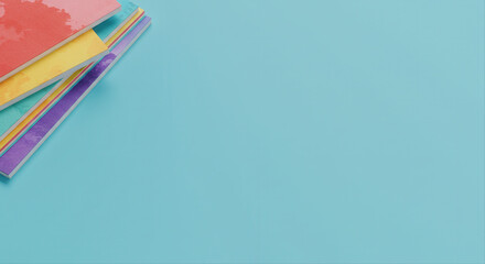 stack of presentation decks. Colorful stationery on blue background for crafting and education  