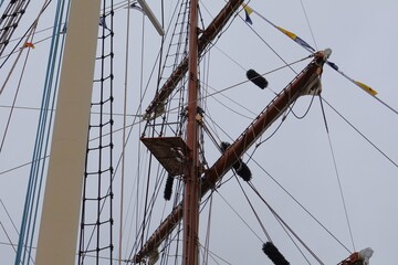 Masts and Rigging of a Tall Ship Against a Sky
