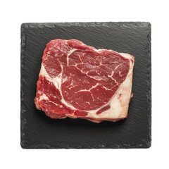 Raw marbled beef steak on dark slate isolated on a transparent background image