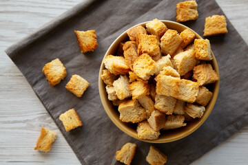 Homemade Crispy Bread Croutons in a Bowl, top view. Close-up.