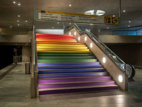 Berlin, Germany - July 25, 2025: Bundestag BVG metro station stairs are painted in rainbow colors resembling LGBTQ pride flag