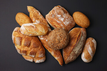 Freshly Baked Artisan Bread displayed on a dark background, highlighting its craftsmanship
