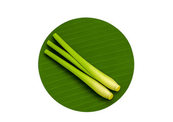 lemongrass, lemongrassstalk, freshlemongrass, thaiherb, asiangrass, herbalingredient, aromaticherb, greenlemongrass, lemongrassonleaf, bananaleafbackground, thaispices,
