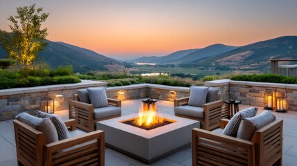 Fototapeta premium Relaxing fire pit on a luxury patio overlooking mountains at sunset