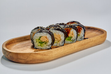 Delicious Sushi Platter Featuring Freshly Rolled Sushi with Colorful Ingredients on a Beautiful...