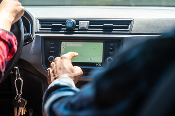 Passenger setting navigation system while driving car