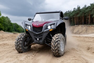 Fototapeta premium All-terrain buggy navigating sandy terrain amidst dense forest