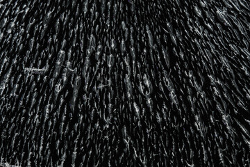 Patterns on abstract glass. Damage to glass. Broken or damaged background on a glass wall.