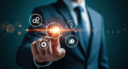 Modern HR Management Concept: Businessman Touching HR Icon with Innovative Technology, Representing Human Resources and Digital Transformation Strategy