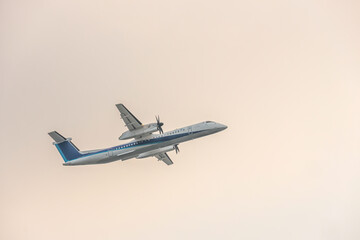 Airplane Lifting Off From Fukuoka Airport Terminal