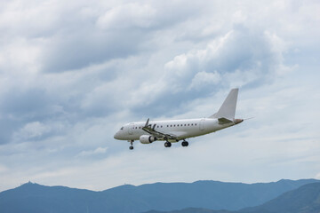 Commercial Aircraft Landing Smoothly At Fukuoka Airport During Summer