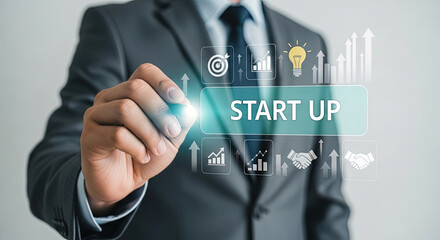 Businessman touching virtual screen with startup icons, representing business strategy, growth, and innovation for successful ventures and goals.
