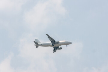 Aircraft Landing Smoothly In Summer Daylight
