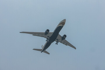 Airliner Approaching Runway On Bright Summer Afternoon