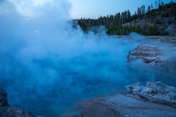 Excelsior Geyser steaming at dusk