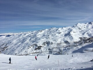 Skiing in the mountains