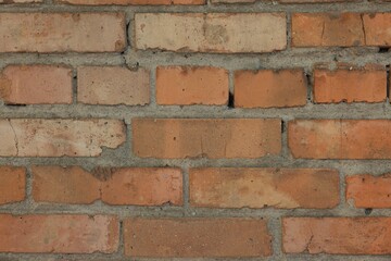 Texture of red brick wall as background, closeup