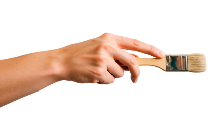 A hand carefully holding a paintbrush, ready to create art or begin painting.
