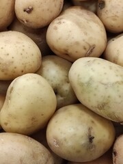 Close-up of fresh organic potato texture.,Primer plano de textura de papa orgánica fresca.(23)