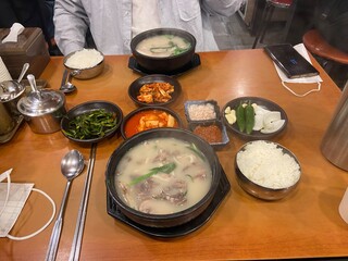 Hearty Korean Gukbap Rice Soup with Onion and Scallion Toppings