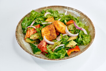 Colorful and Fresh Salad Featuring Crisp Lettuce, Assorted Vegetables, and Golden-Brown Fried Protein, Perfectly Balanced for a Healthy Meal Option
